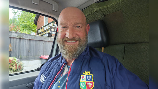 Graham smiling inside his work van before heading to a construction site, featured in his Mind Lab Pro® customer story.